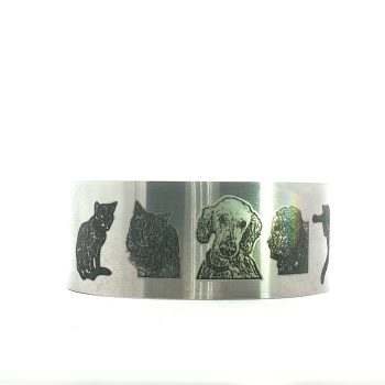 The “Forever Friend” Custom Pet Portrait Cuff is a silver bracelet engraved with sitting and fluffy cats, a dog, a dog's profile, and a wagging dog—perfect for fans of custom engraved jewelry.