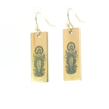 The “Radiant Grace” Virgin Mary Rectangle Earrings feature a black engraved Virgin Mary on gold, custom crafted with simple hooks. Their metallic shine stands out against a brightly lit background.